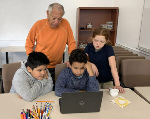 Mickey Klein working with UTElementary students
