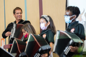 Joel Guzman with UT Elementary Advanced Accordions