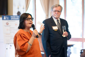 Drs. Ramona Trevino and William Lasher giving the "Founders Toast."