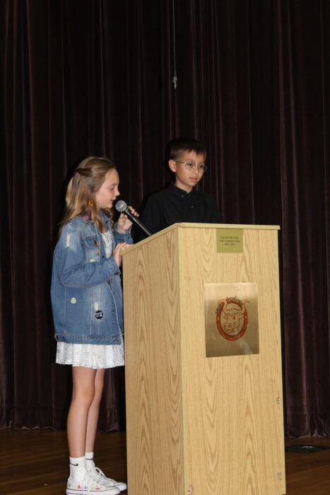 Two 5th grade student leaders speak at graduation.