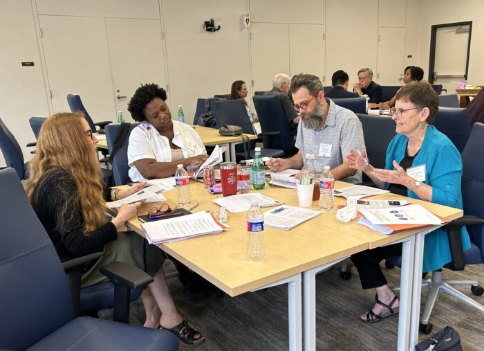 UT Elementary board members Eusebi, Simmons, Johnson and Armenta at a board training.