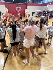 Texas Sweethearts cheering for the Little Longhorns