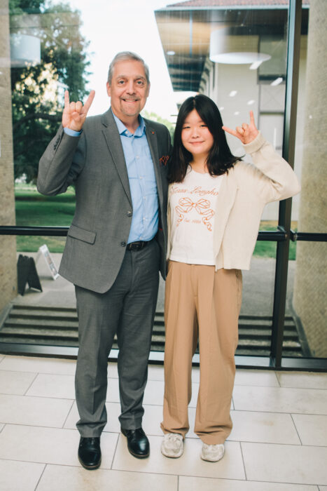 College of Education Dean Charles Martinez with senior Christina Kim