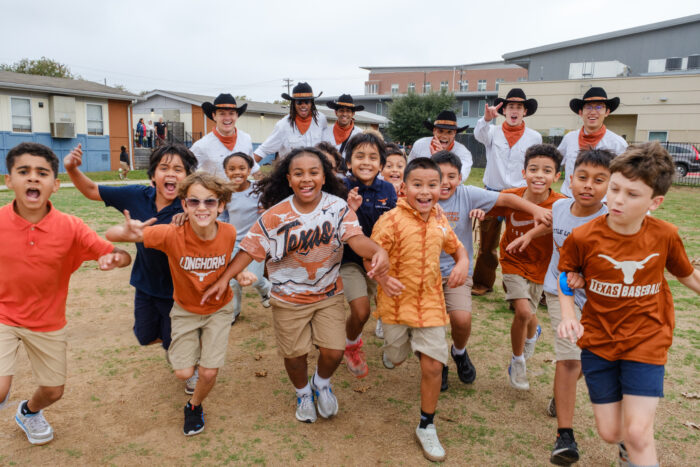 A joyful photo of the Little Longhorns and Texas Cowboys